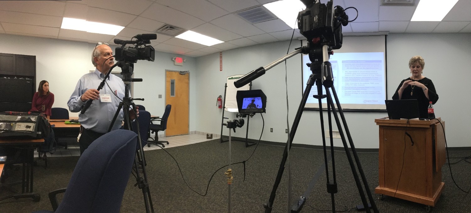 Tommy filming a corporate review