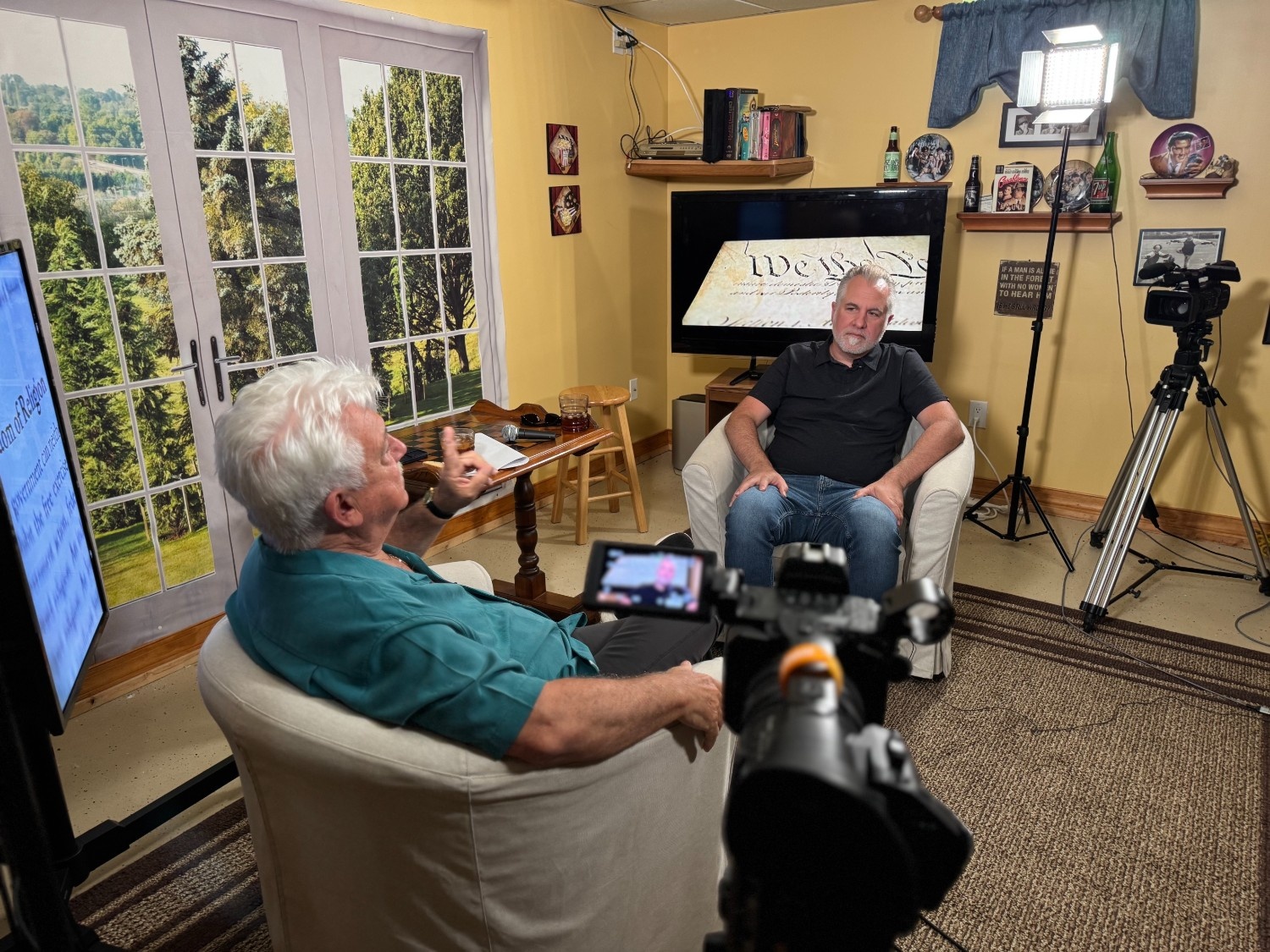 Tommy filming an interview in a studio