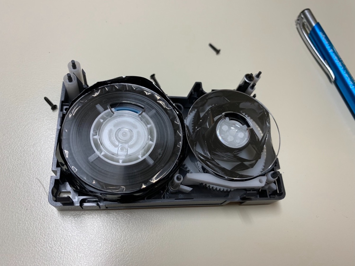 Opened VHS cassette shell during repair
